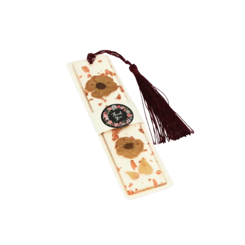 Zakładka do książki z żywicy z suszonymi brązowymi kwiatami – 14 cm - Giftoria - zestawy prezentowe Zakładka do książki z żywicy z suszonymi brązowymi kwiatami – 14 cm - Giftoria - zestawy prezentowe
