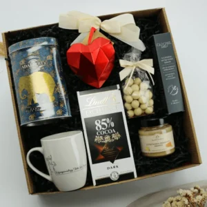 Prezent dla taty z&nbsp;herbatą i&nbsp;słodyczami – Zestaw z&nbsp;kubkiem „Najwspanialszy Tata”  -  Giftoria - zestawy prezentowe